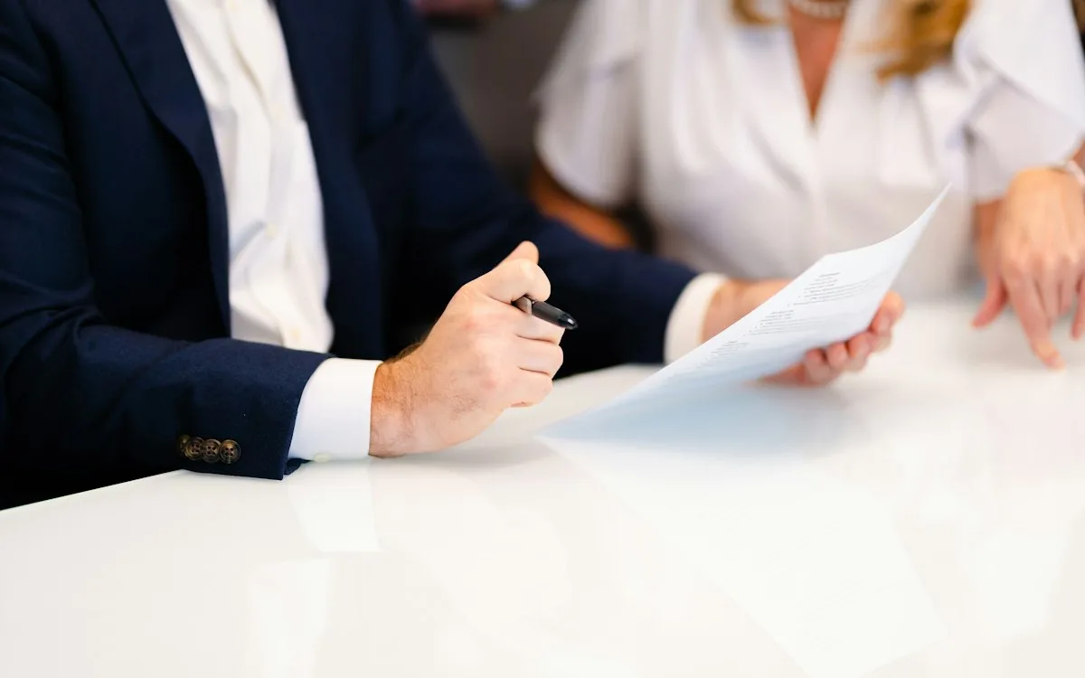 Insurance advisor reviewing a policy with a client